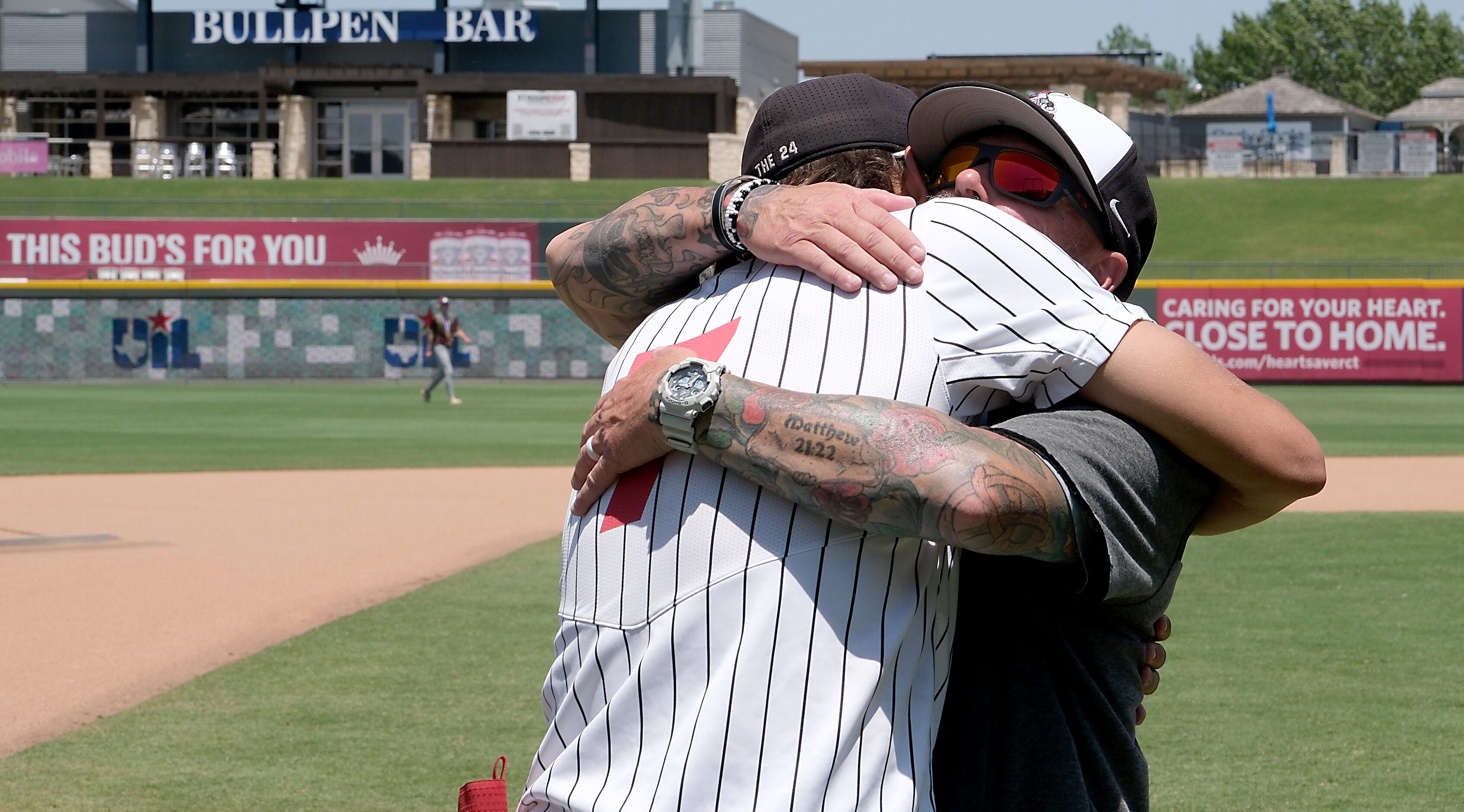 Argyle head coach, Ricky Griffin, hugs Park Prater, (7), following the team’s 3-2 loss to ...