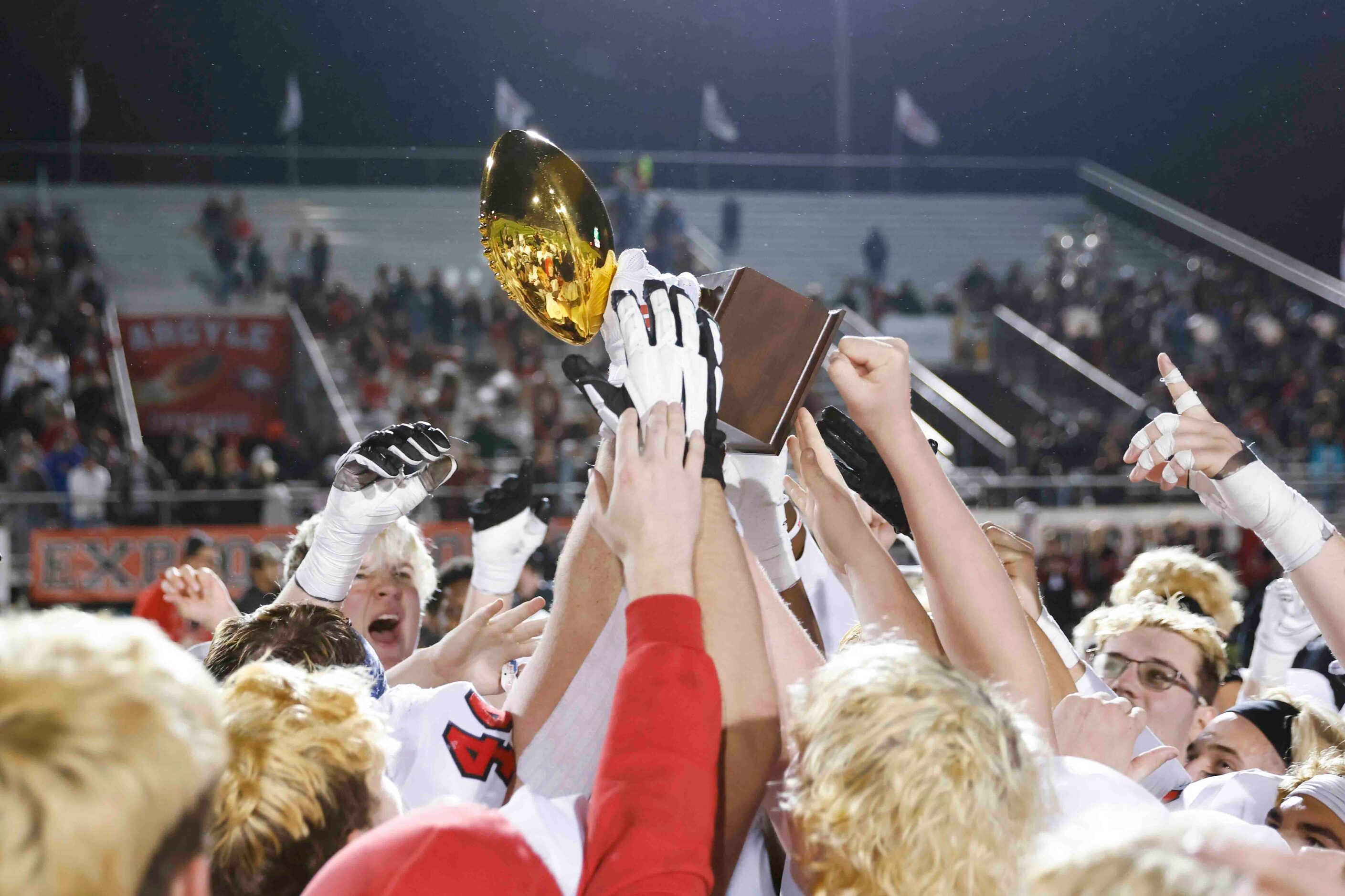 Argyle high players celebrate after winning against Grapevine High during the second half of...