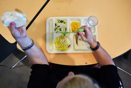 Sherrill Phillips, 50, sits down for lunch during  National Hunger Awareness Day at The...