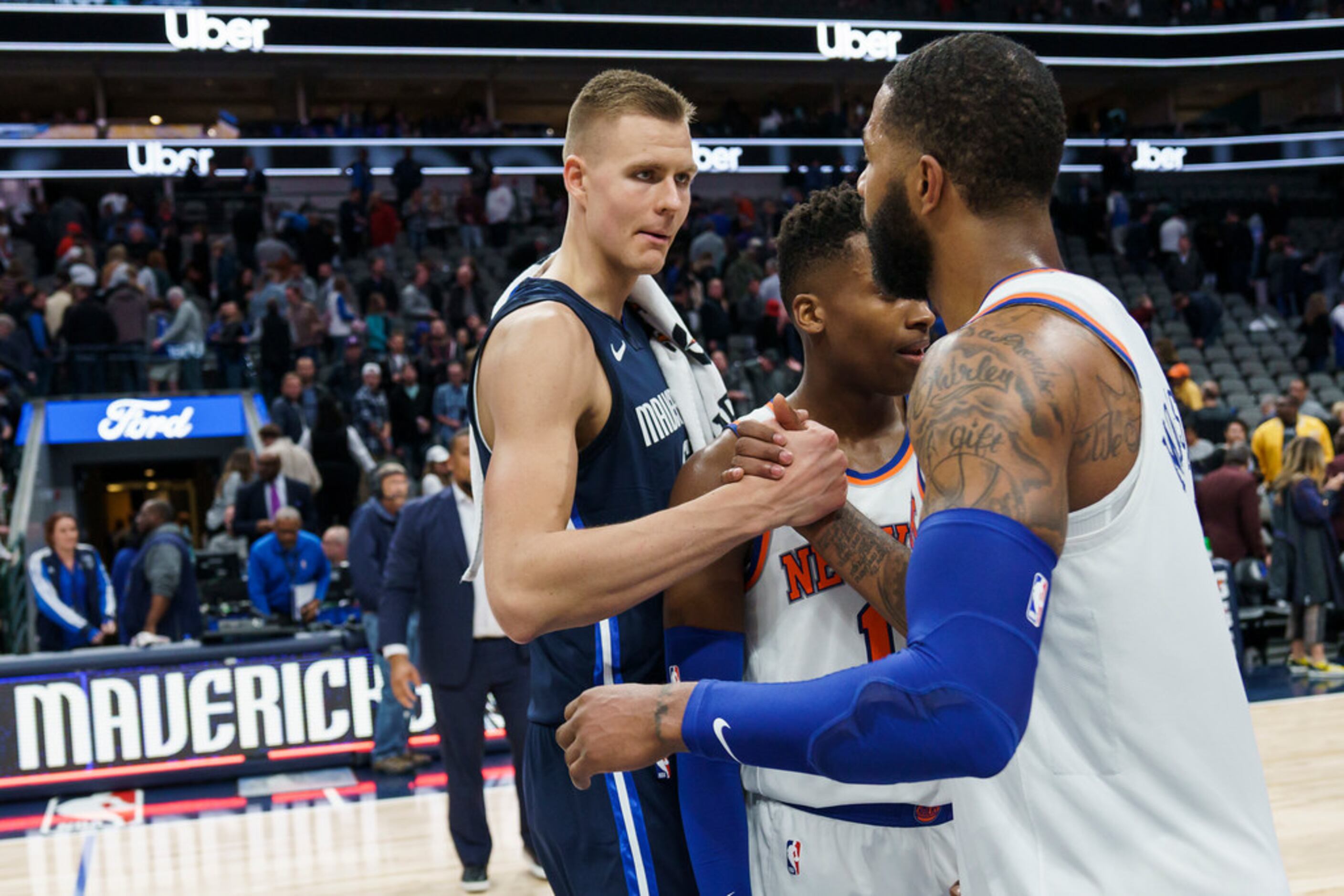 Dallas Mavericks forward Kristaps Porzingis congratulates New York Knicks forward Marcus...