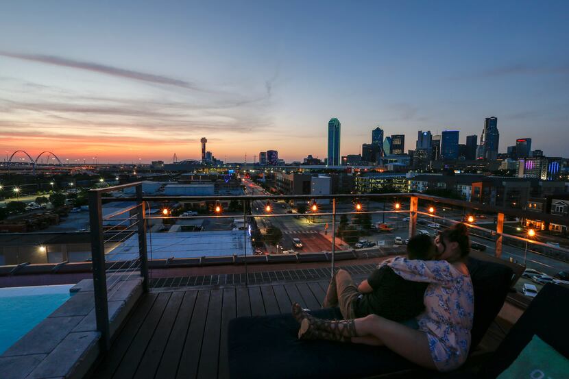 Aurelio Hernandez and Elizabeth Barajas watch the sunset from Nylo Dallas Southside bar in...