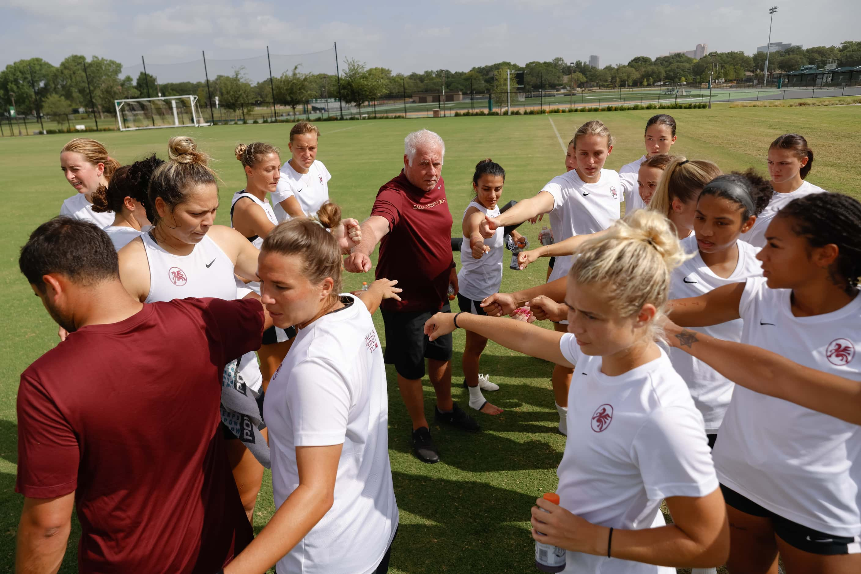 Dallas Trinity FC General Manager Chris Petrucelli, center left, huddles with the team and...