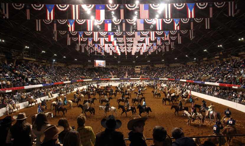 Horses and riders fill the arena during the Grand Entry for the "Best of the West"...