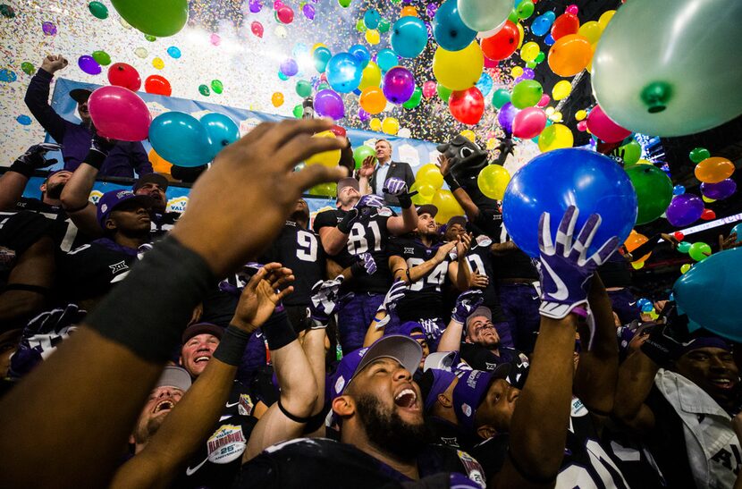 TCU Horned Frogs celebrate a 39-37 win over the Stanford Cardinals after the Valero Alamo...