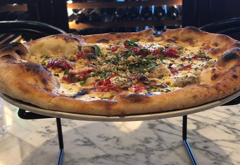 The clam pizza, with garlic, cream, lemon and chile, is $10 on Mondays too. Usually it's $18.
