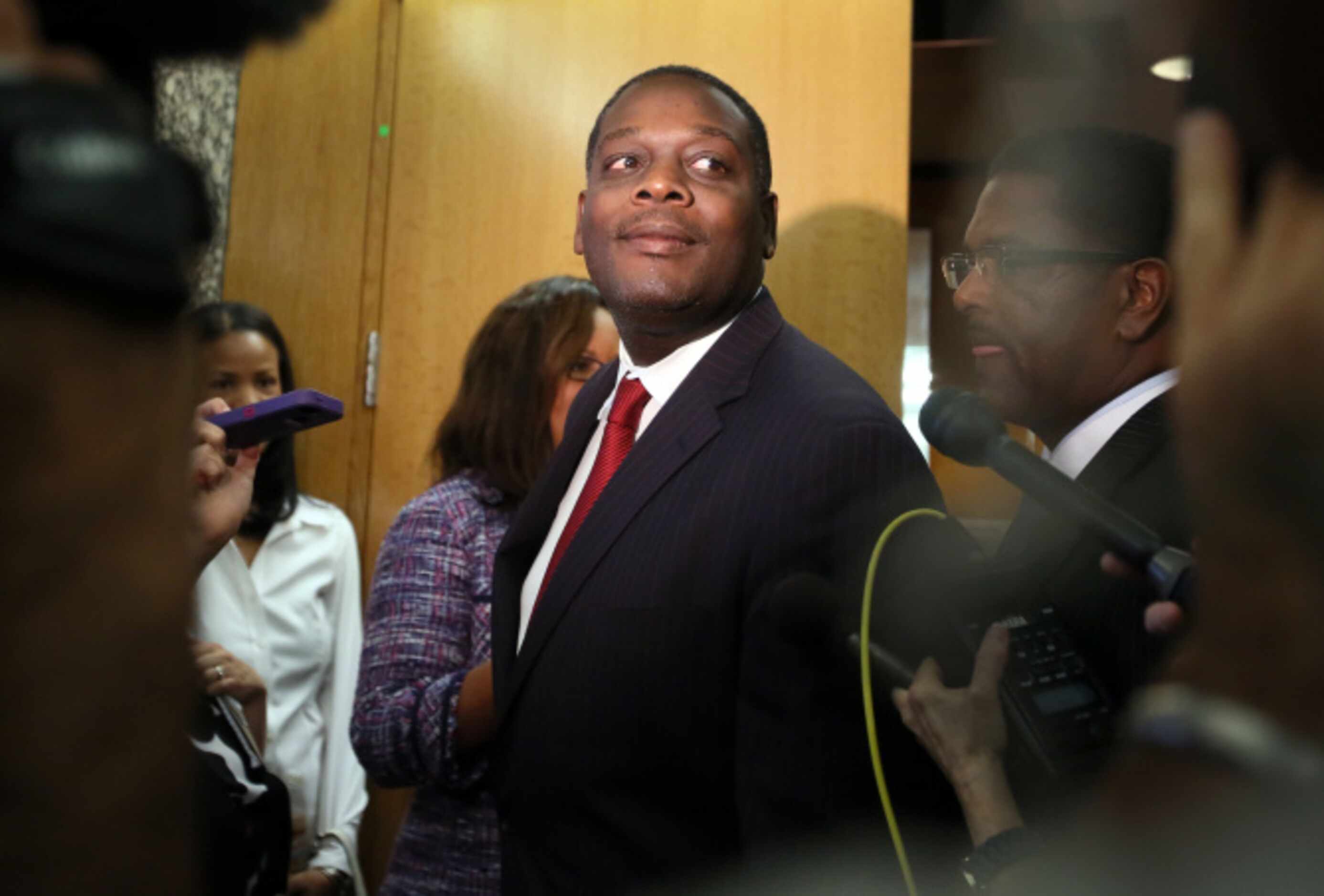 Dallas County District Attorney Craig Watkins, after being acquitted of contempt of court on...