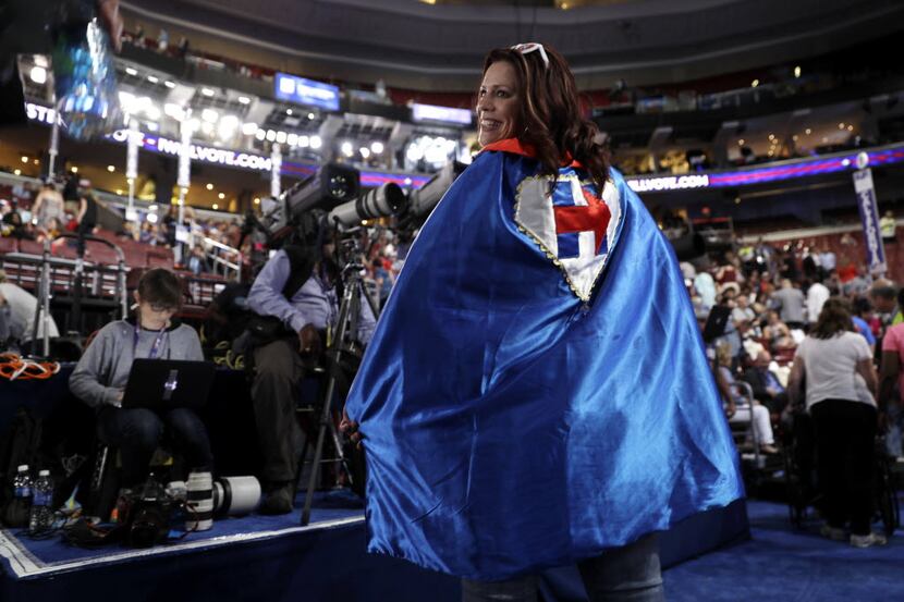 Texas delegate Kim Frederick of Houston showed off her cape Wednesday at the Democratic...