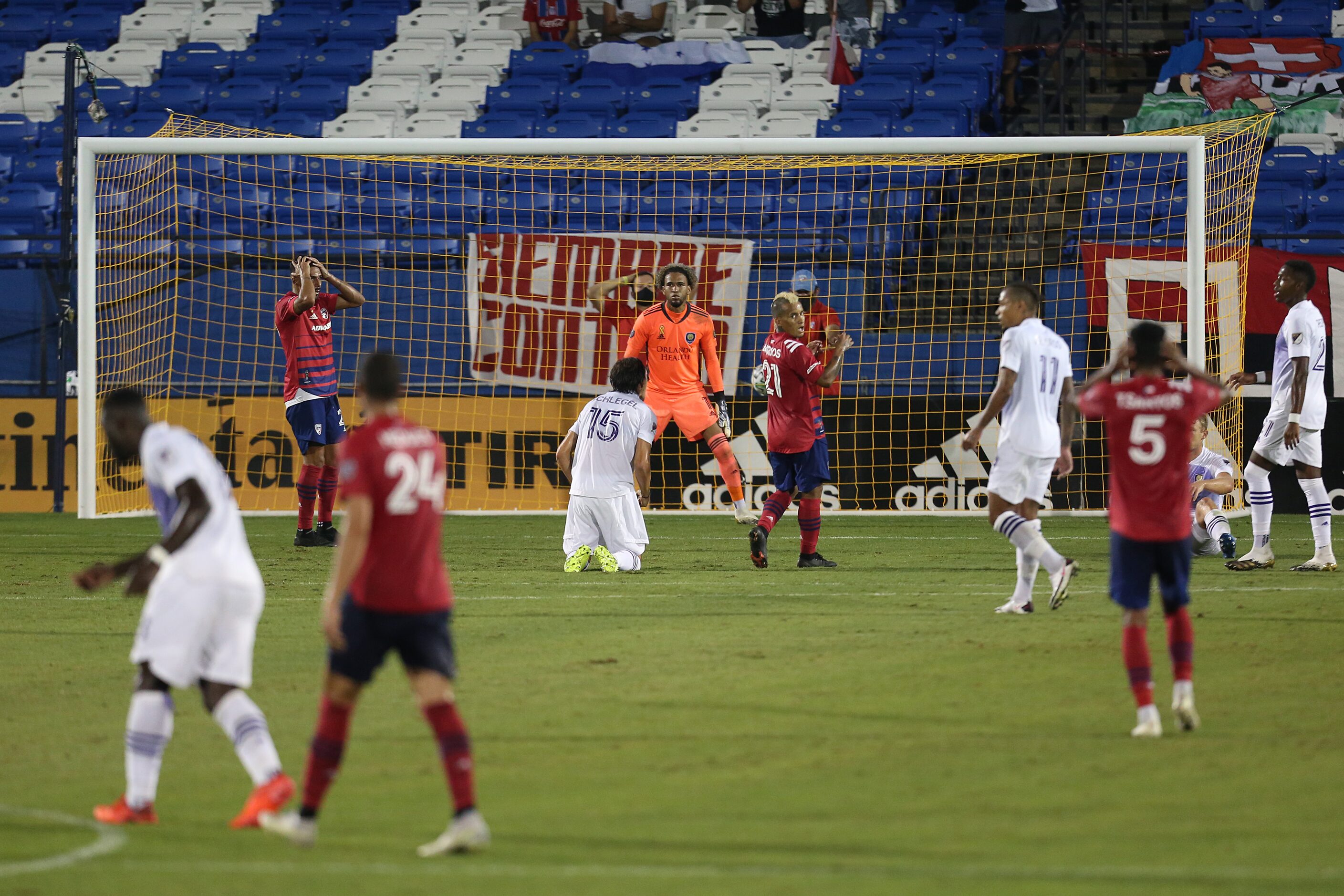 FRISCO, TX - SEPTEMBER 27: Franco Jara #29 and Michael Barrios #21 of FC Dallas reacts after...