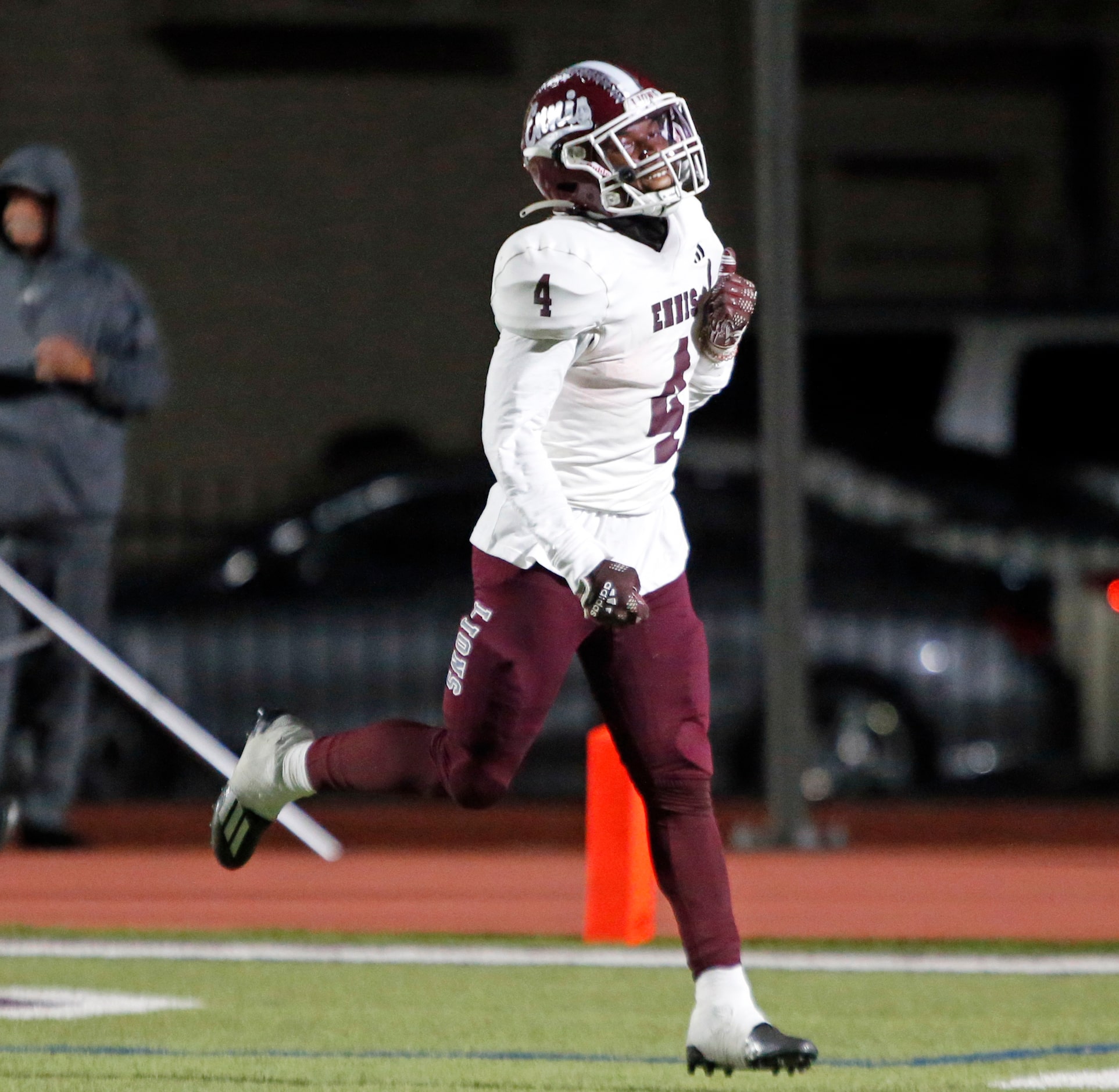 Ennis high RB Jeremy Brown Jr. (4) is all smiles, after scoring a touchdown during the first...