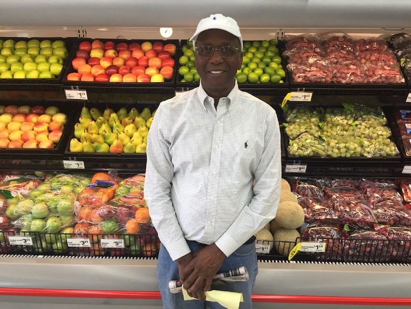 Joseph Kemp stands in front of produce at his new Save-A-Lot store at 3450 Simpson Stuart...