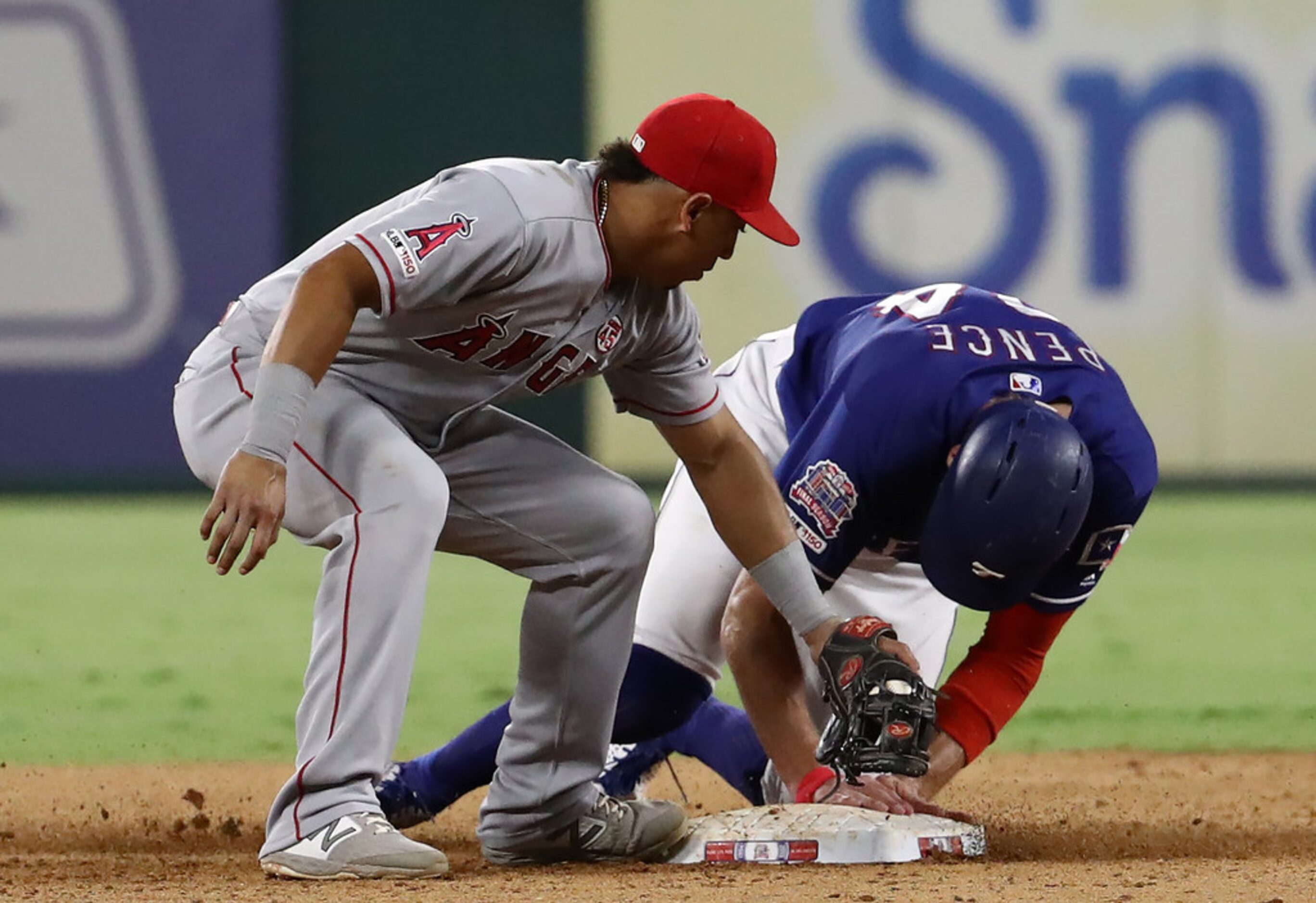 ARLINGTON, TEXAS - AUGUST 21:  Hunter Pence #24 of the Texas Rangers steals second base...