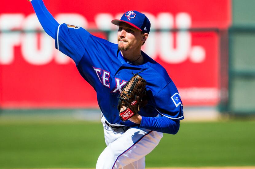 Texas Rangers relief pitcher Tanner Scheppers (52) pitches during the fifth inning of a...