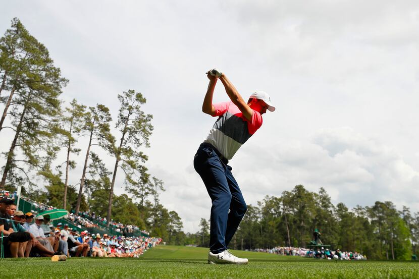 AUGUSTA, GEORGIA - APRIL 12: Jordan Spieth of the United States plays his shot from the 14th...