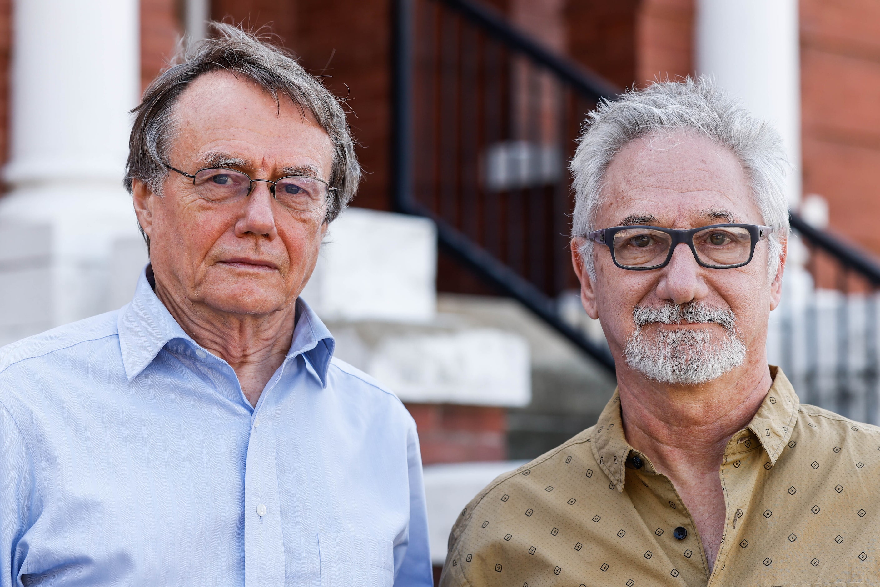 Rene Schmidt, left, and Jim Anderson, in front of the church property, are two local...