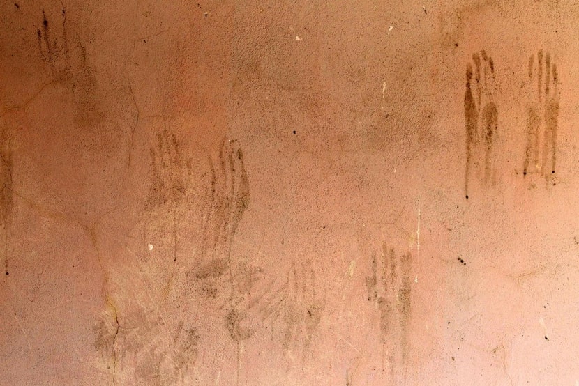 View of one of the walls of the room inside a farm where five missing young men were...