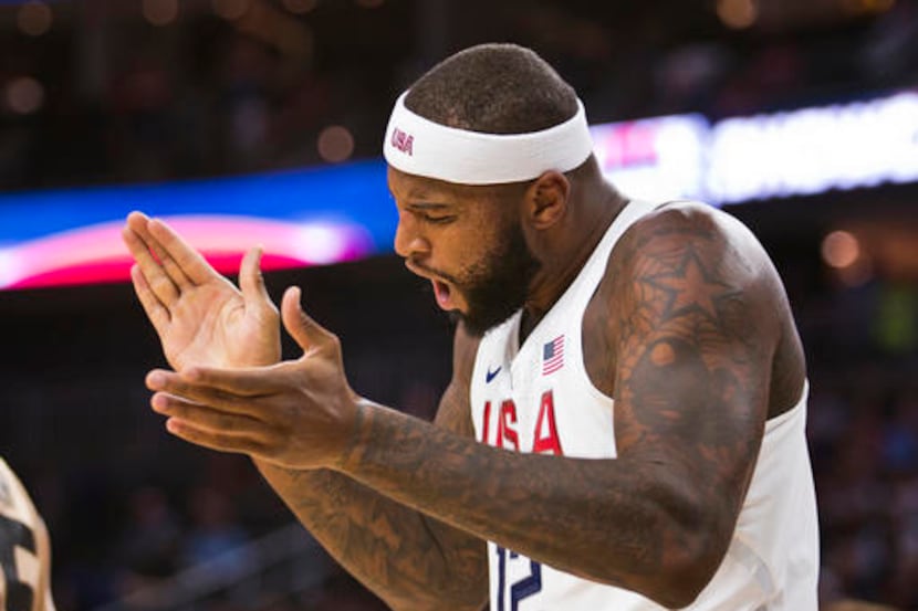 United States' DeMarcus Cousins (12) celebrates a basket against Argentina during an...