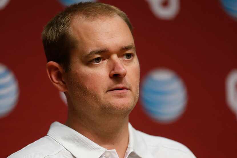 In this Saturday, Aug. 2, 2014 photo, Josh Heupel, Oklahoma co-offensive coordinator and...