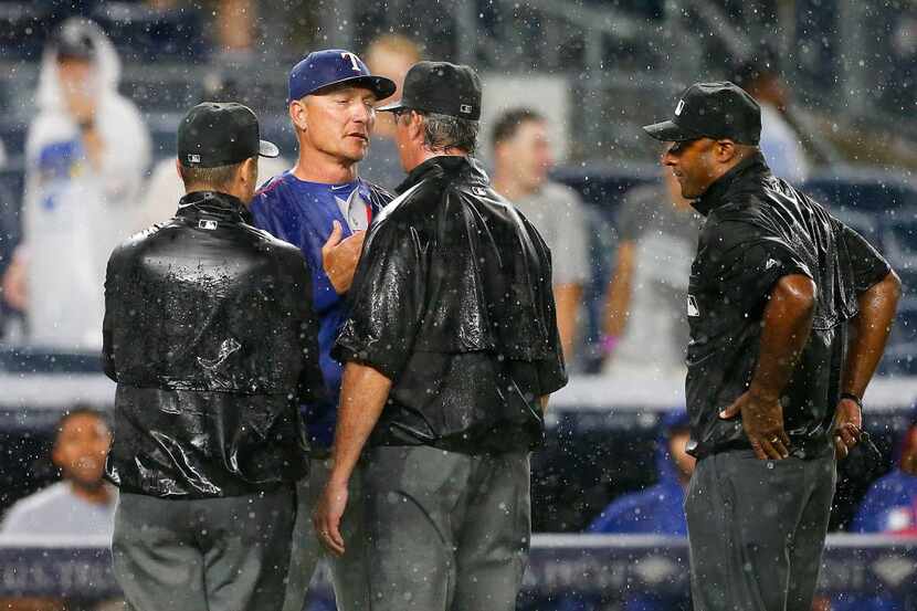 NEW YORK, NY - JUNE 27:  Manager Jeff Banister #28 of the Texas Rangers argues with the...