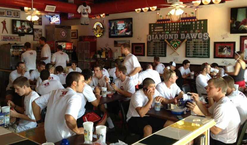  Diamond Dawgs, a late-night spot in Norman, Okla., serves greasy food to college kids....