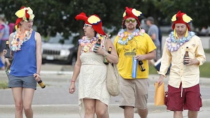 Finally! A place to wear your parrot hat. These fans were on their way to the concert last...