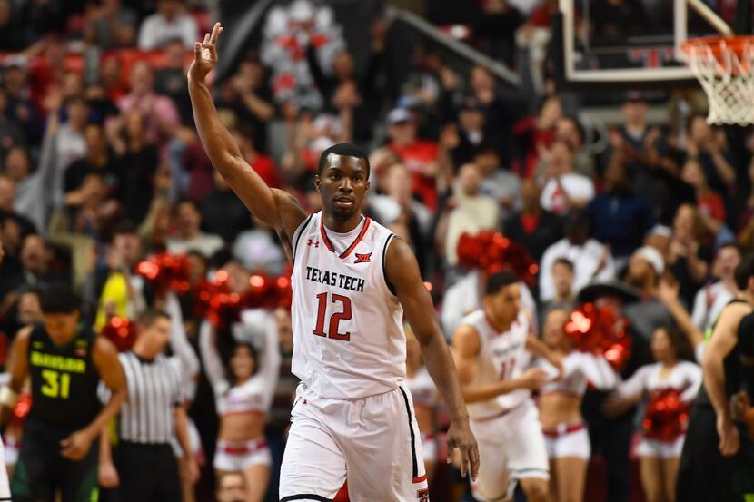 LUBBOCK, TX - FEBRUARY 13: Keenan Evans #12 of the Texas Tech Red Raiders reacts to making a...