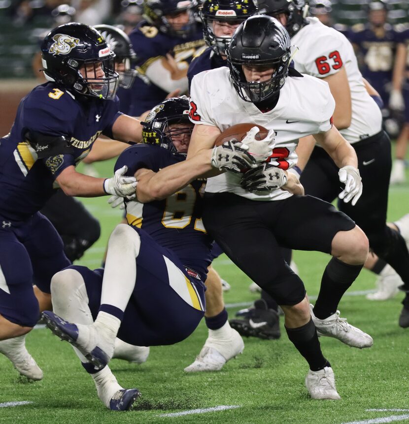 Stephenville defensive lineman Kevin Bowery (81) and defensive back Grayson Traweek (3)...