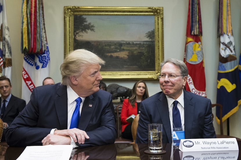 President Donald Trump sits with Wayne LaPierre, executive vice president and CEO of the...
