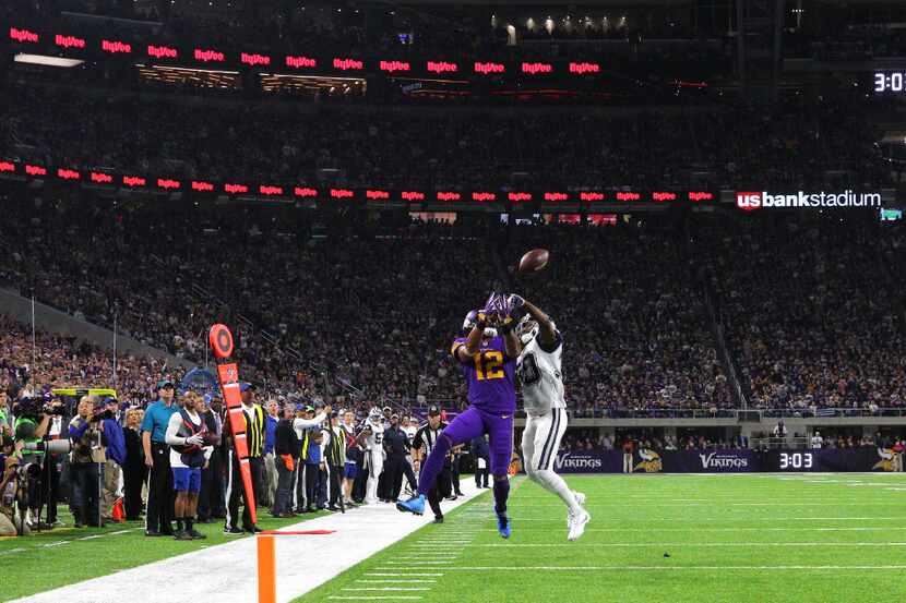 MINNEAPOLIS, MN - DECEMBER 1: Anthony Brown #30 of the Dallas Cowboys breaks up a pass to...