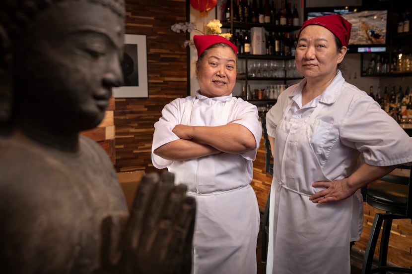 Dumpling makers Huajuan Shen, left, and Sophia Chen from Royal China restaurant in Dallas,...