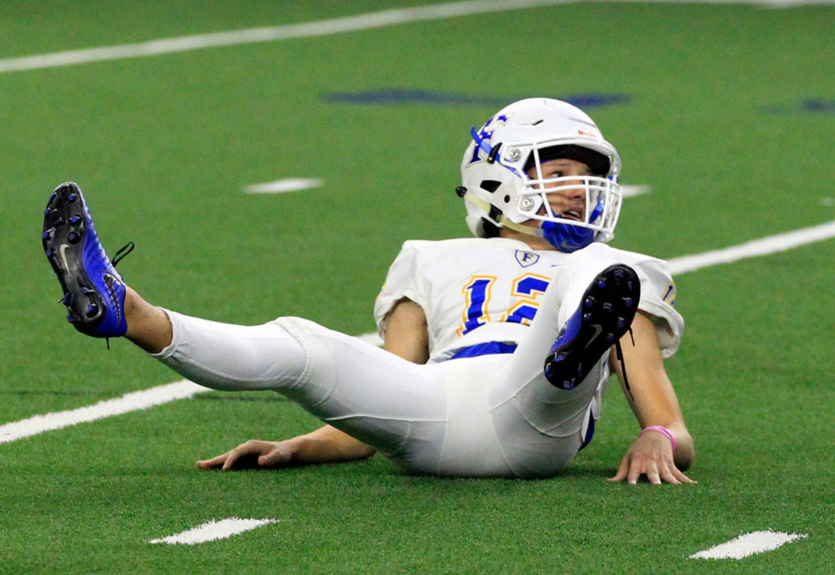 Frisco kicker Jake Gaster (12) watches his kick sail through the uprights for a field goal...