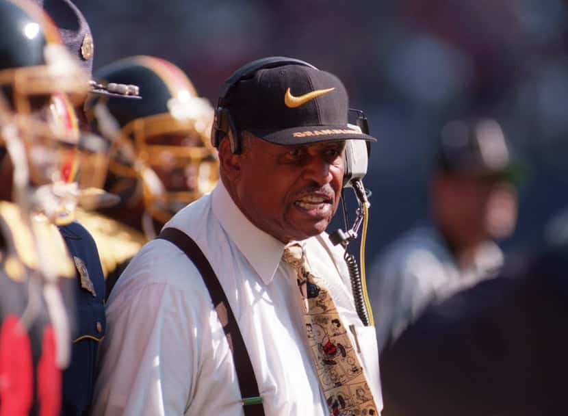 Coach Eddie Robinson on the sidelines as his Grambling football team played Hamptons...