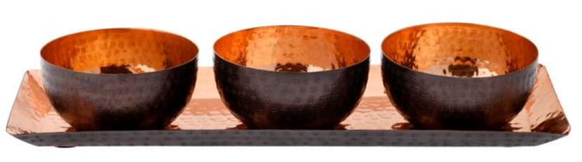 
A trio of three copper-inlaid bowls on a tray equals perfect snack presentation. $70 from...
