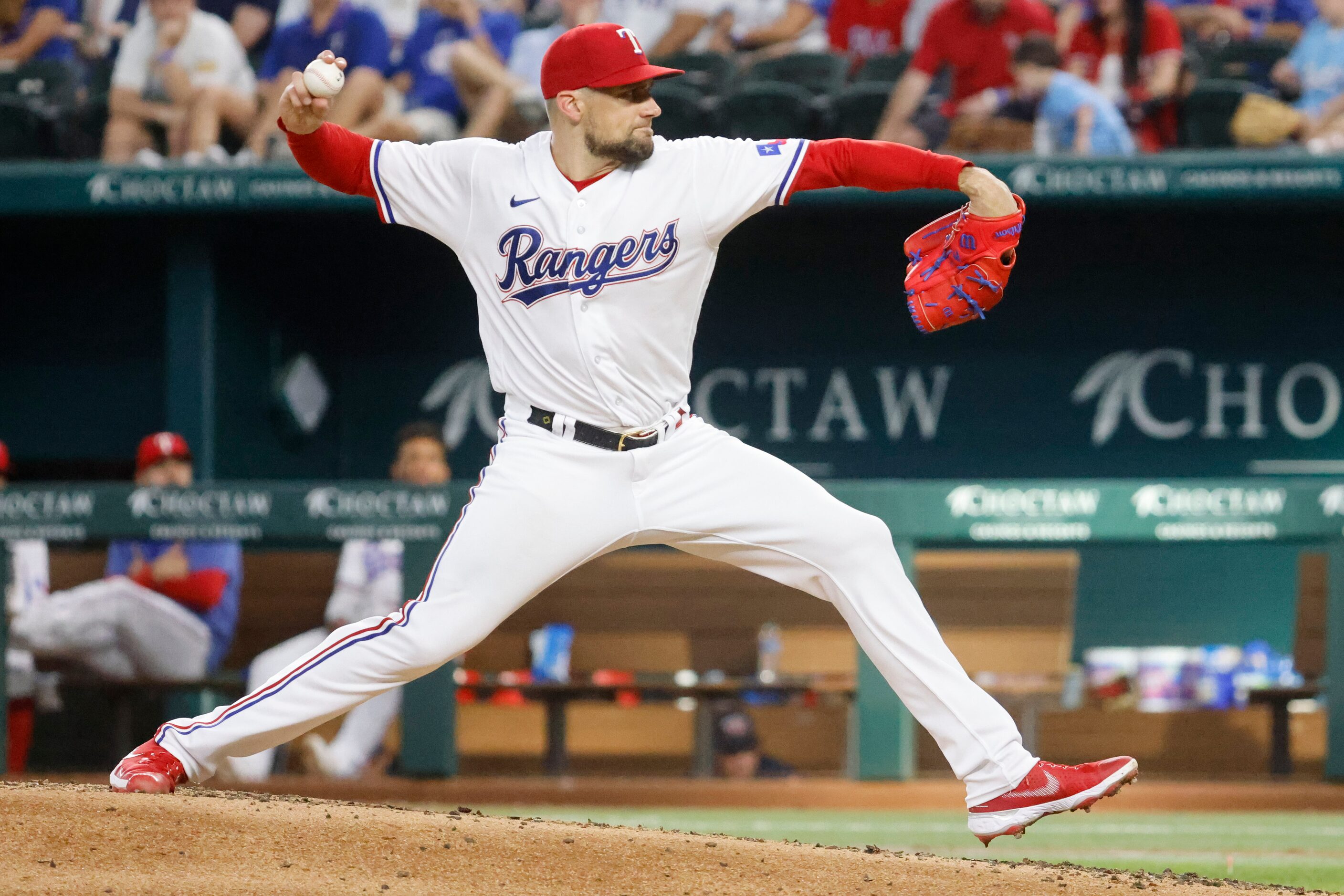 Texas Rangers starting pitcher Nathan Eovaldi throws during the third inning of a baseball...