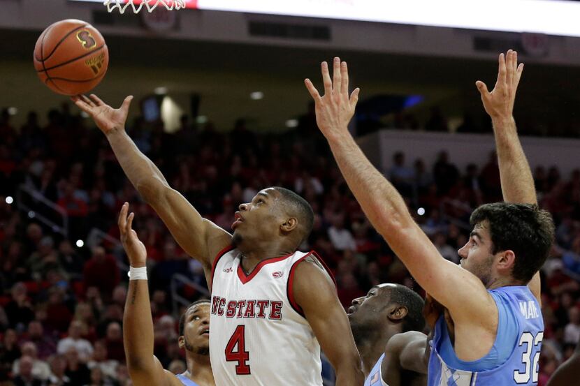 North Carolina State's Dennis Smith Jr. (4) shoots against North Carolina during the the...
