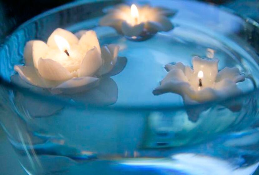 
Susan Plapp makes dozens of different candles, including beautiful floating flowers....