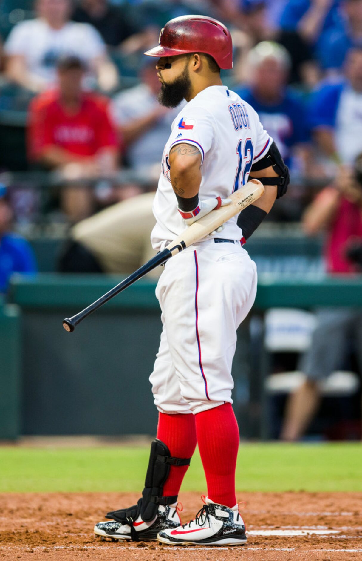 Texas Rangers second baseman Rougned Odor (12) reacts to striking out during the second...