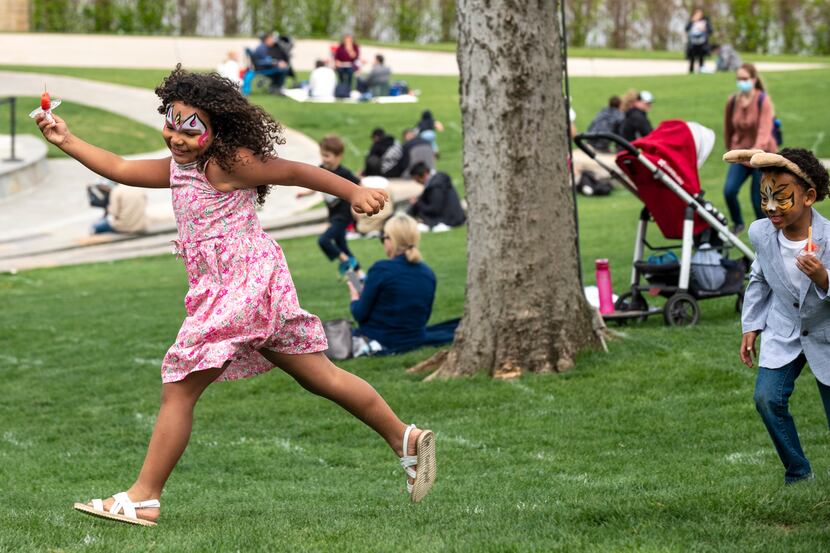 Isadora Peña, 6, runs freely while playing with her cousin Kaniel Williams, 5, of Austin, as...
