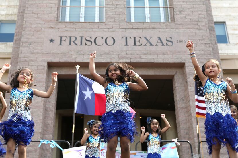 Young dancers perform during the Global Village Frisco event in Frisco, Texas, Saturday,...