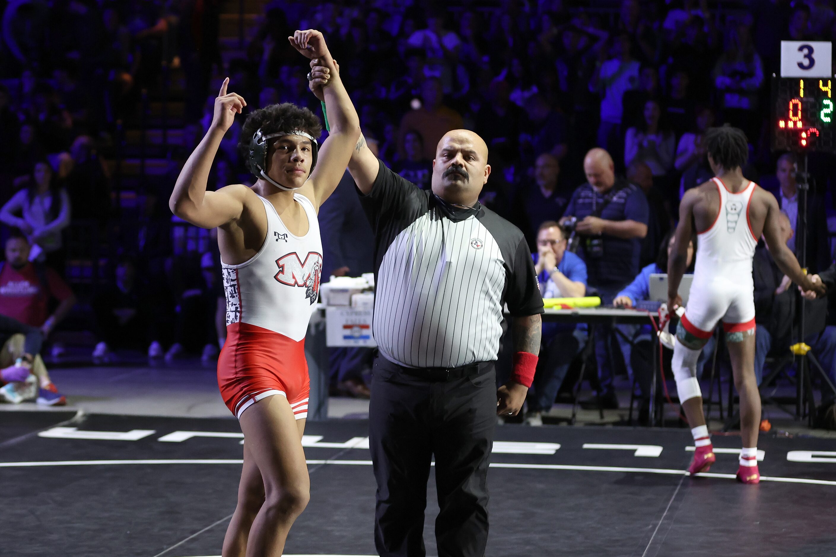 Nicholas Zamora of Arlington Martin defeats Javin Jackson-Bey of Allen in the Boys 6A...