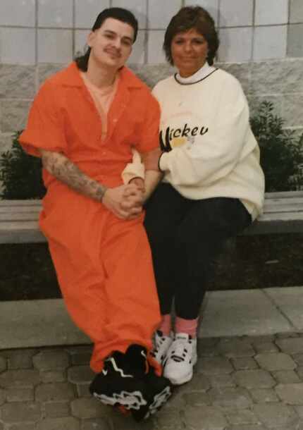 David Weigand poses with his mother, Deborah Mahlke, while incarcerated in West Virginia. He...