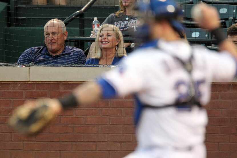 Nolan Ryan and his wife Ruth Ryan watch as the Texas Rangers play the Seattle Mariners...