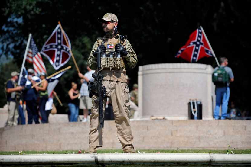 A Texas Liberty Coalition security person, who goes by the name Bulldog, stood guard last...