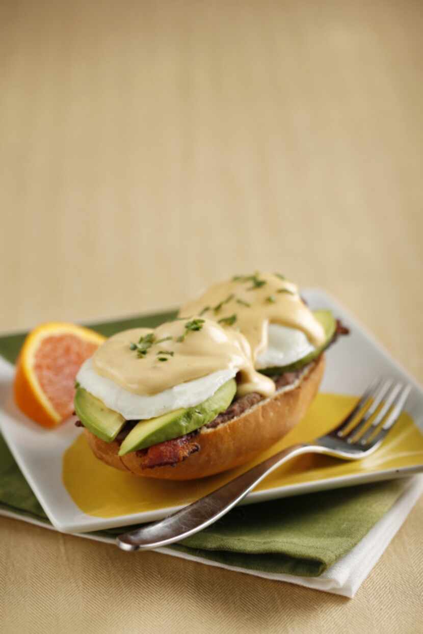 Start with a split toasted bolillo roll spread with refried black beans and grated cheese;...