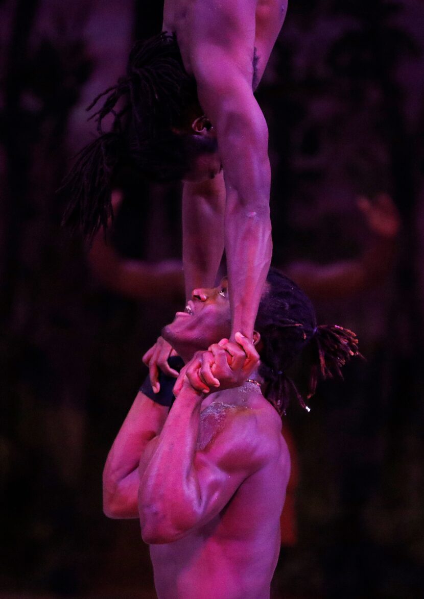 Dancers perform a handstand during a preview of Cavalia's production Odysseo in Frisco,...