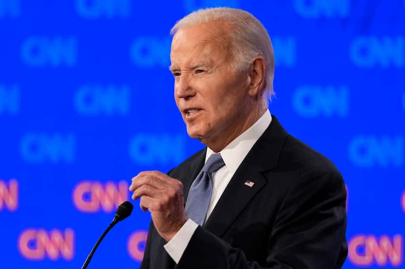 President Joe Biden speaks during a presidential debate hosted by CNN with Republican...