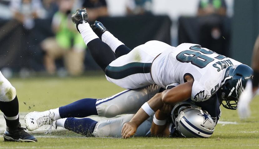 Dallas Cowboys quarterback Tony Romo (9) is injured as Philadelphia Eagles outside...