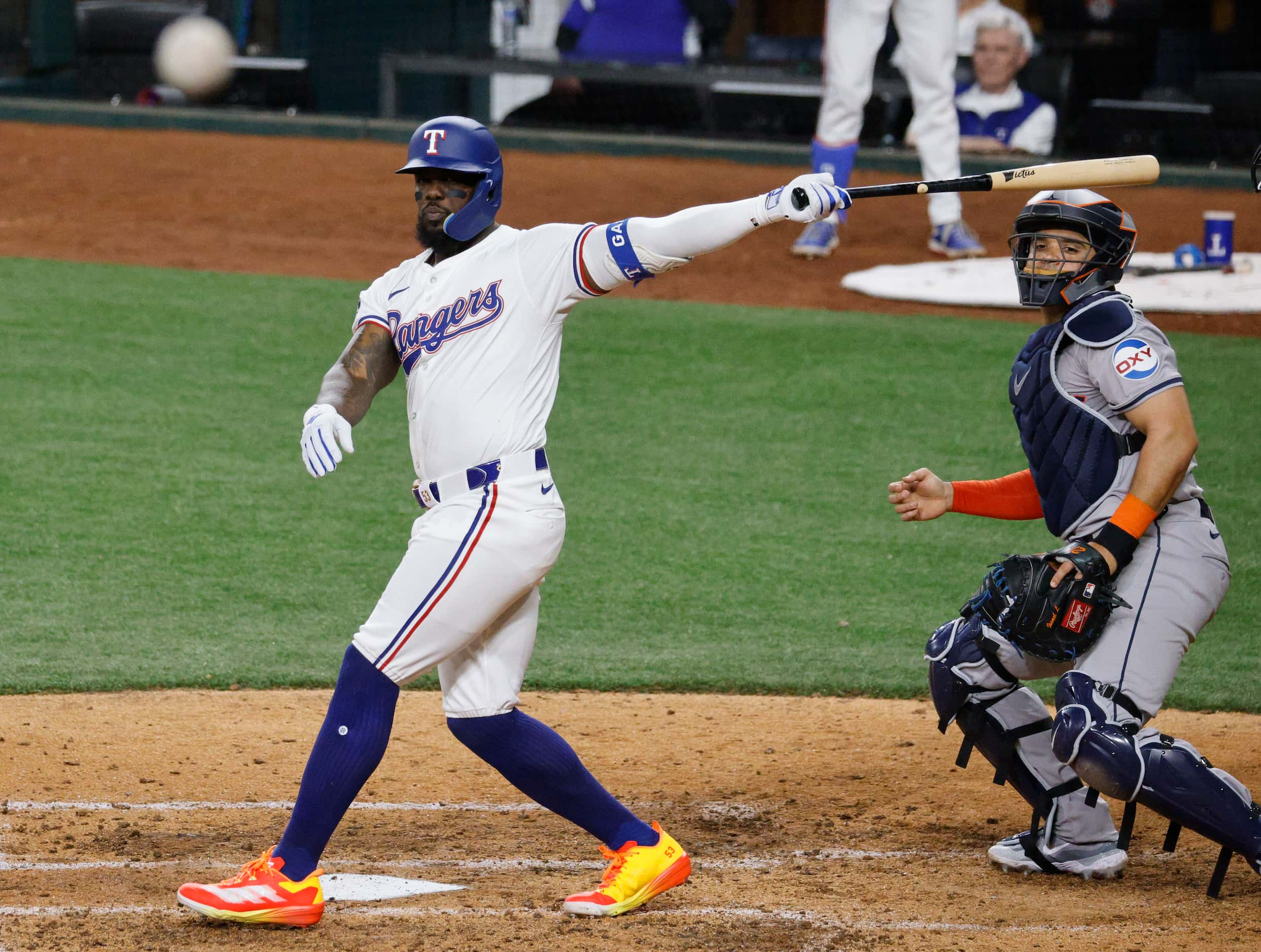 Texas Rangers outfielder Adolis García (53) hits a foul ball as Houston Astros catcher...