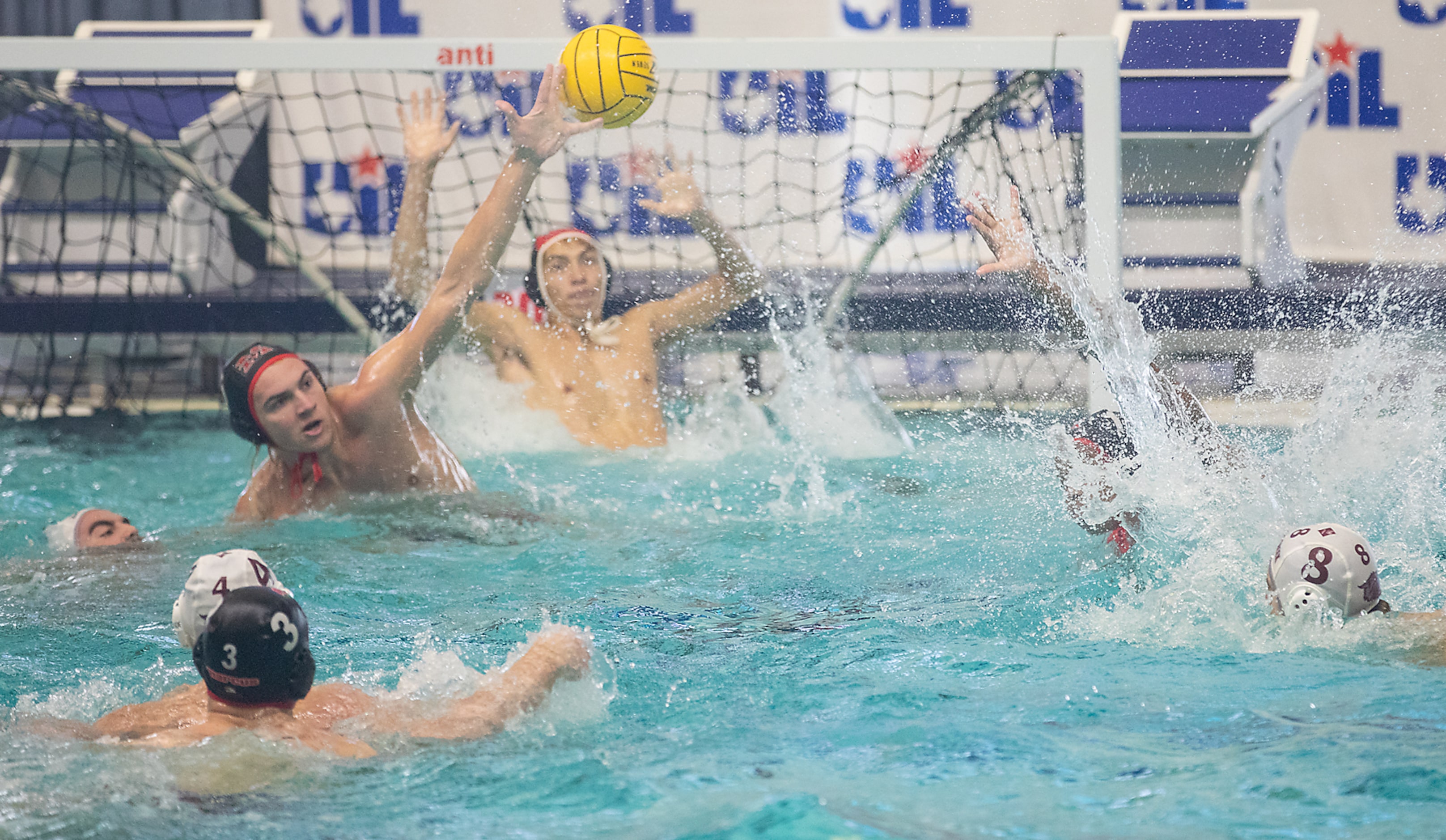 Flower Mound Marcus utility Landon Heuer tries to block a shot from Clear Creek utility...