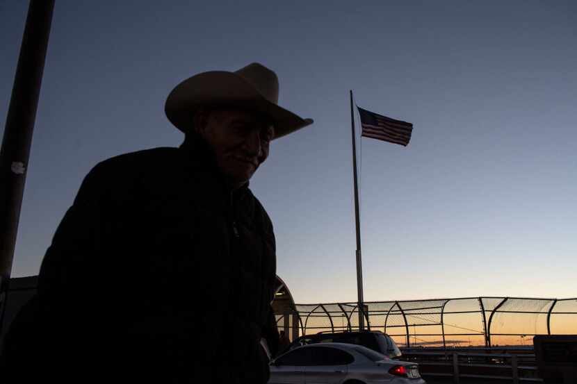 A man walks to Mexico at El Paso del Norte International Bridge on the US/Mexico border in...