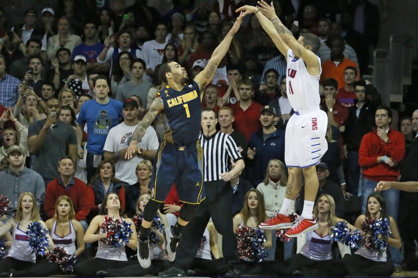 SMU's Nic Moore (11) puts up the winning shot over Cal's Justin Cobbs (1) during the final...